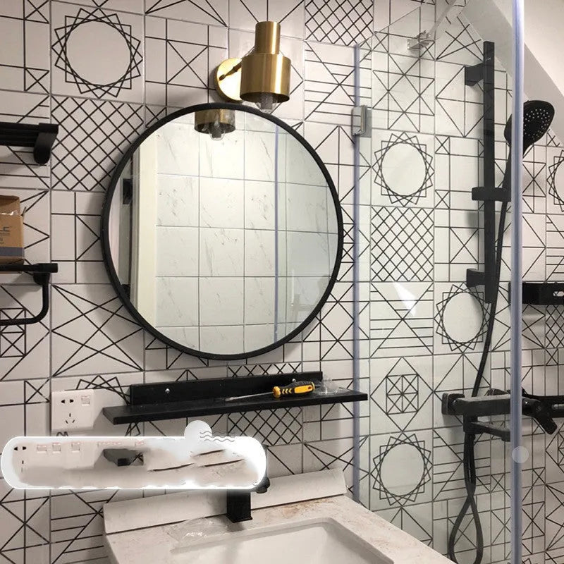 Round metal-framed wall mirror in black, white, or gold for bathroom.