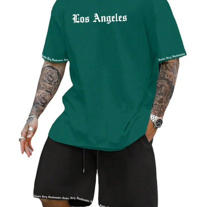Man wearing a printed short-sleeve sports top and matching shorts in a quick-dry polyester blend.