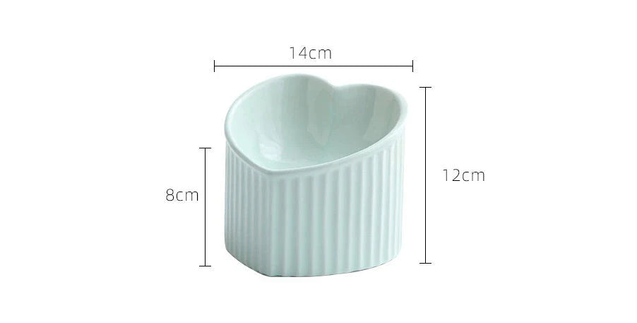 Elevated ceramic pet bowl with tilted design for comfortable and healthy feeding