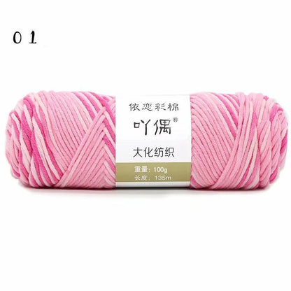 Eight strands of gradient milk cotton wool in a ball, showing multiple colour options for hand knitting.