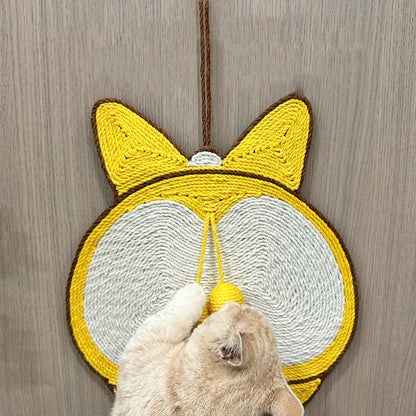 Yellow Corgi-butt design sisal cat scratching pad with anti-slip base, shown with adhesive hooks for wall mounting.