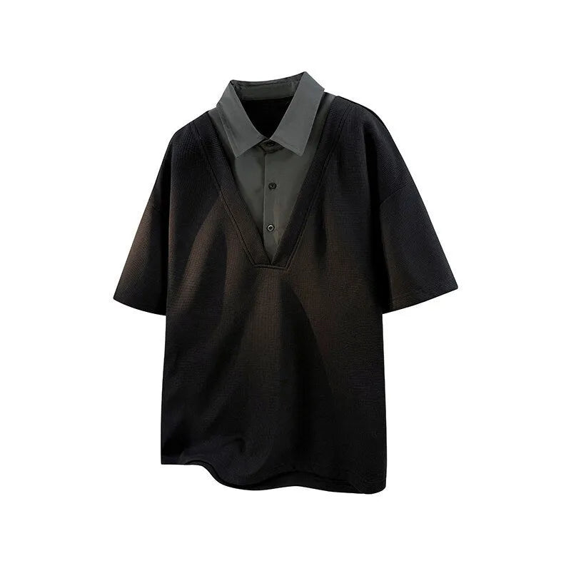 Man wearing a black henley collar short sleeve spandex pullover sweater.