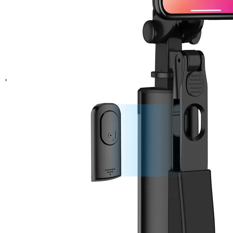 Black aluminium Bluetooth selfie stick with tripod feet and remote control extended to medium length.