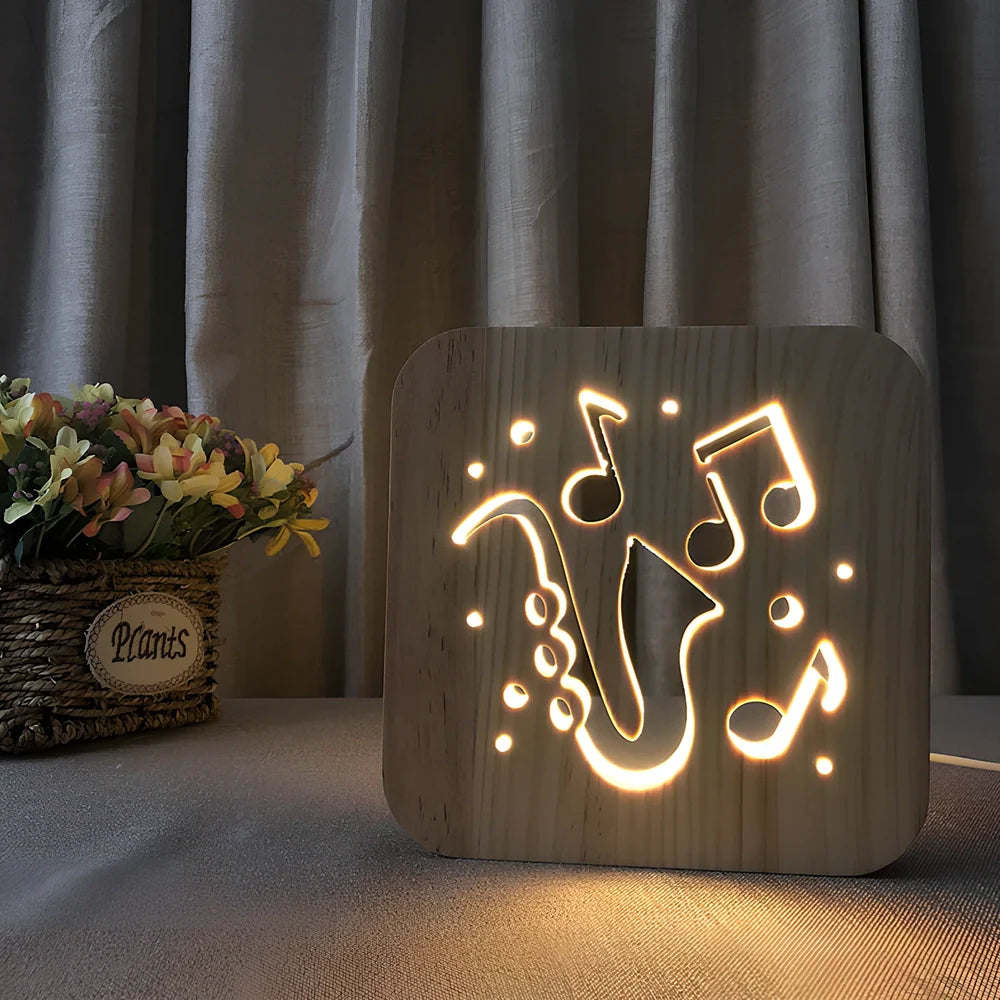 3D wood carving LED night light depicting musical instruments with USB power cable