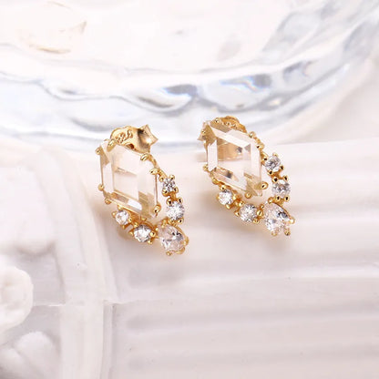 Geometric sterling silver ear studs with sweet white crystal stones