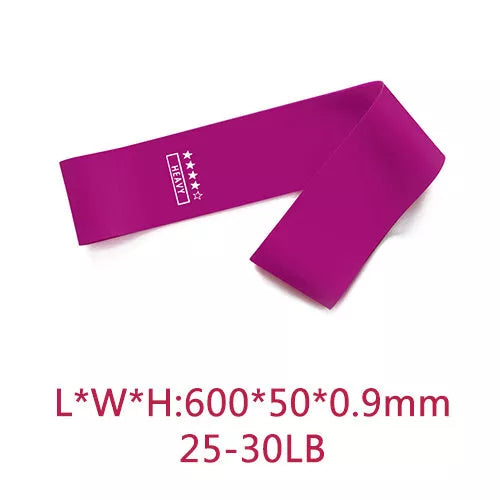 Yoga tension band set in five colours with varying resistance levels for fitness and Pilates