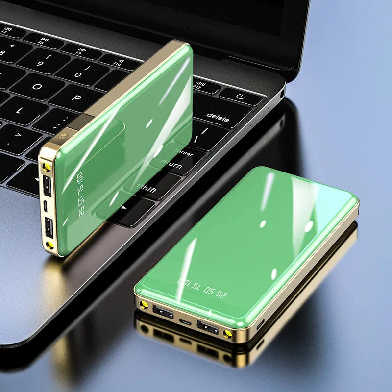 Square-shaped 20000mAh power bank with digital display screen showing battery percentage.