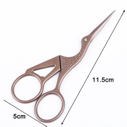 Elegant crane-shaped embroidery scissors crafted from premium stainless steel for precise, effortless cutting