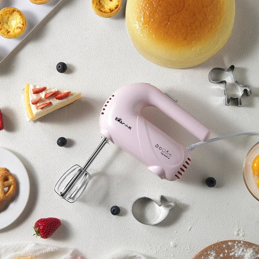 Pink Winnie electric whisk with 150W power for whipping eggs and cream, including box packaging