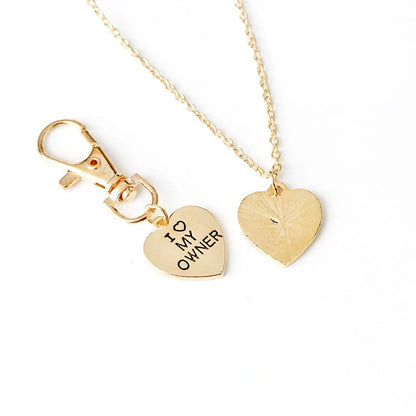 Stylish dog bone necklace for pet lovers, available in silver and gold.