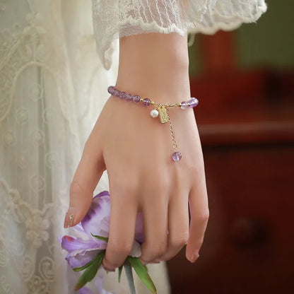 Women's natural lavender amethyst crystal bracelet in elegant design on wrist