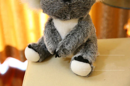 A soft, cuddly koala plush toy with short, premium plush fur and 100% pure cotton filling, showcasing the high-quality British craftsmanship.