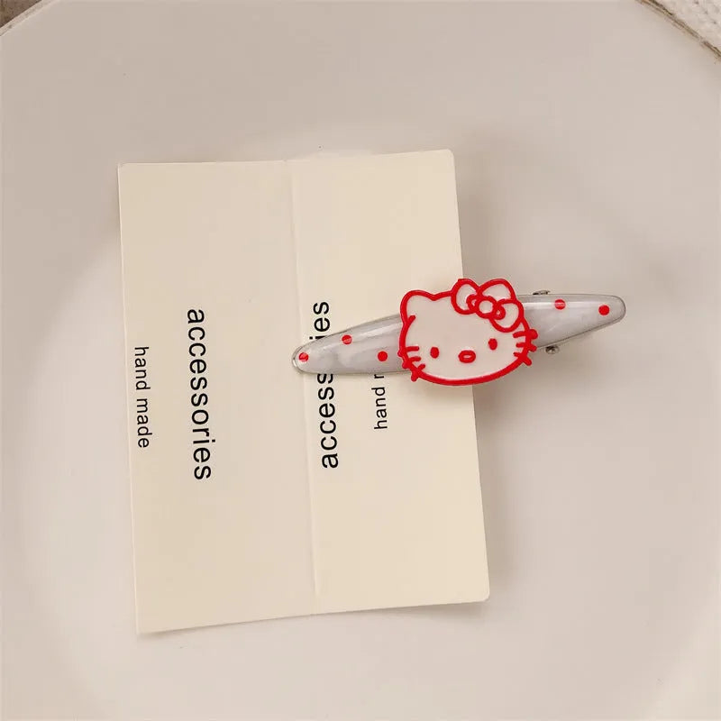 Red love heart-shaped hair barrette clip with retro white dots on a willow leaf-shaped base.