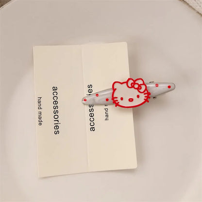 Red love heart-shaped hair barrette clip with retro white dots on a willow leaf-shaped base.