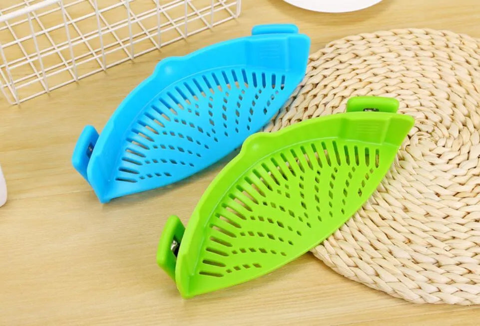 Silicone clip-on pot strainer in multiple colours for draining liquids, with buckle design and uniform hollow pattern