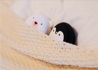 Cute cartoon penguin and polar bear design USB rechargeable hand warmer and power bank unit.