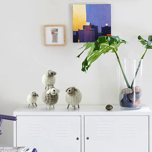 Plush sheep figurines in various colors and sizes, perfect for home decoration and gifting
