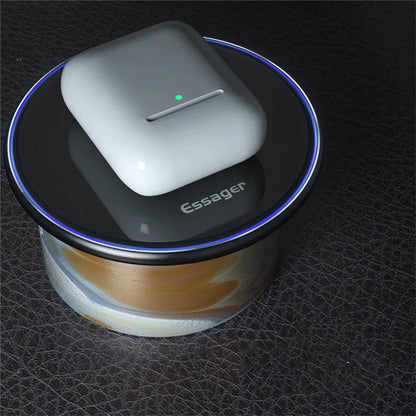 Black wireless charging pad with LED indicator light, measuring 10.1 by 7 centimetres