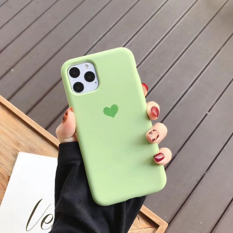 Solid colour silicone iPhone case shown in six colour options including dark green, flour and light pink.