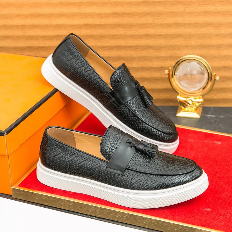 Men's black casual leather shoes with fringe detailing on round toe and low heel