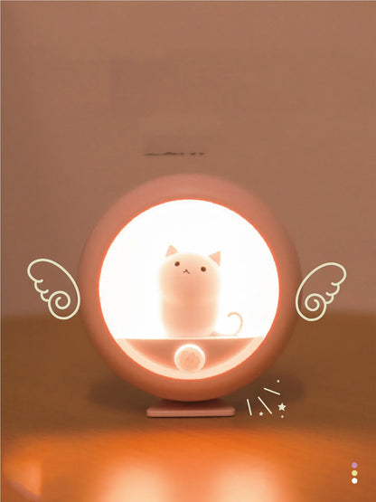 Baby bedside sleep lamp showing orange, pink and white colour modes with projection feature