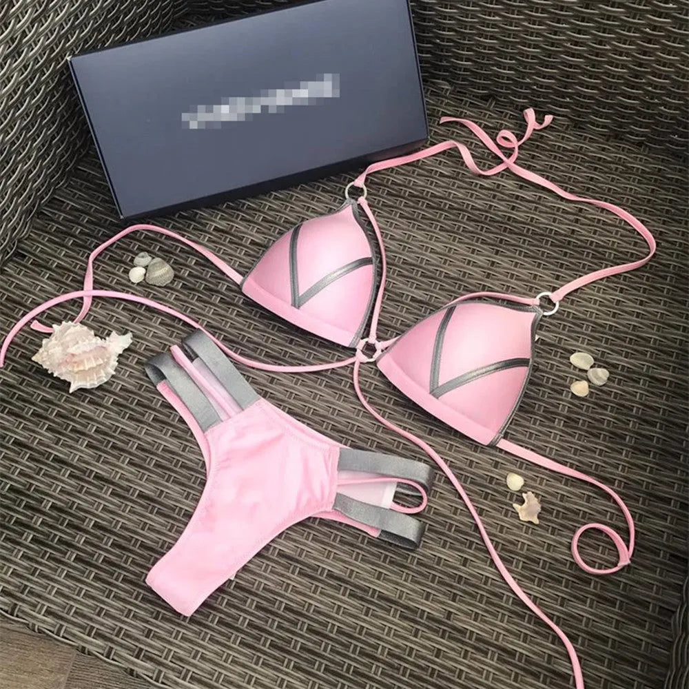 Women's bronzing bikini with padded cups in a selection of colours including black, blue, leopard print, and snakeskin print.
