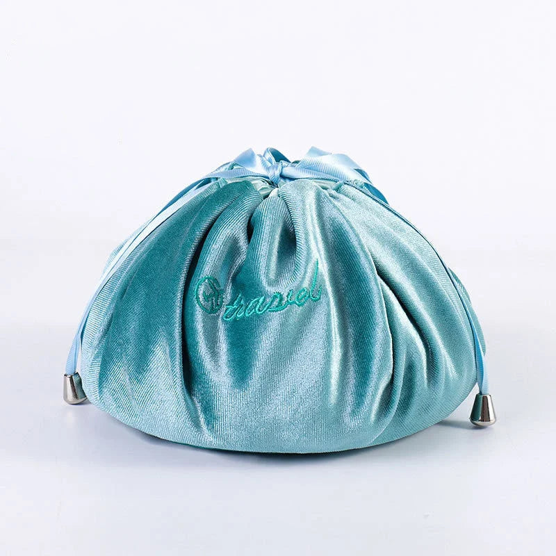 Adorable rabbit ear velvet cosmetic bags in various colors for storing and organizing makeup, toiletries, and other beauty essentials.