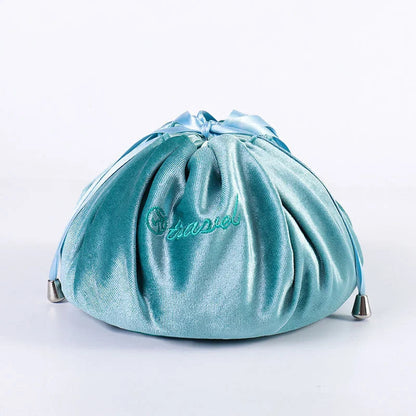 Adorable rabbit ear velvet cosmetic bags in various colors for storing and organizing makeup, toiletries, and other beauty essentials.