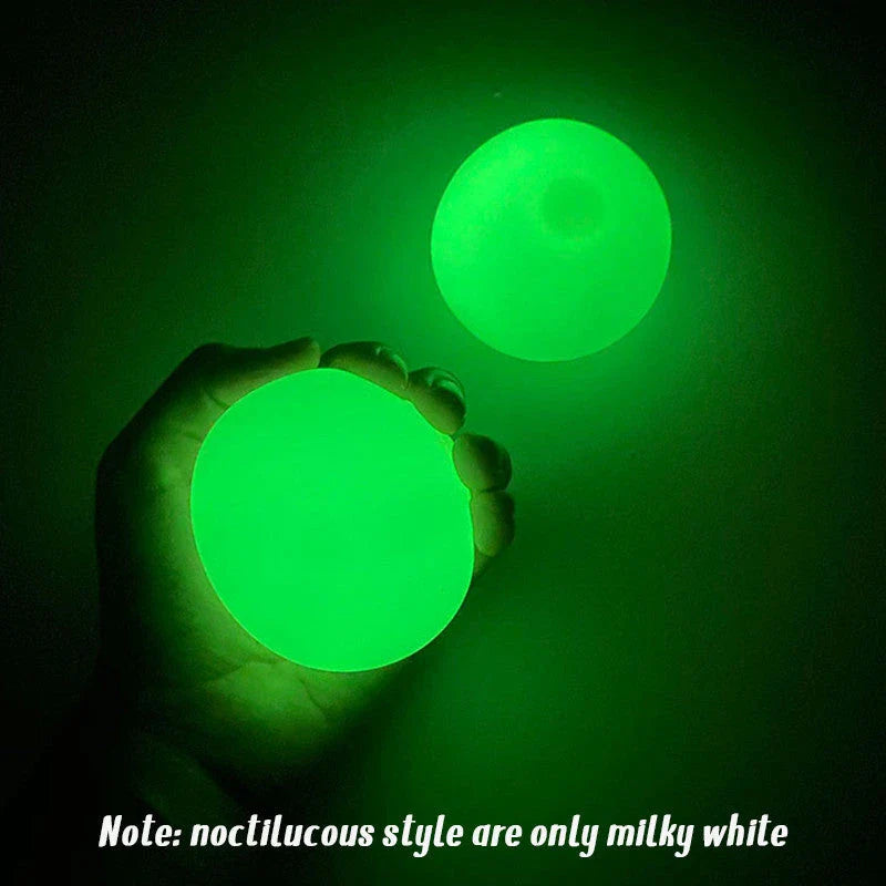 Colorful, luminous stress relief balls with a sticky surface for bouncing, squeezing, and sticking to surfaces