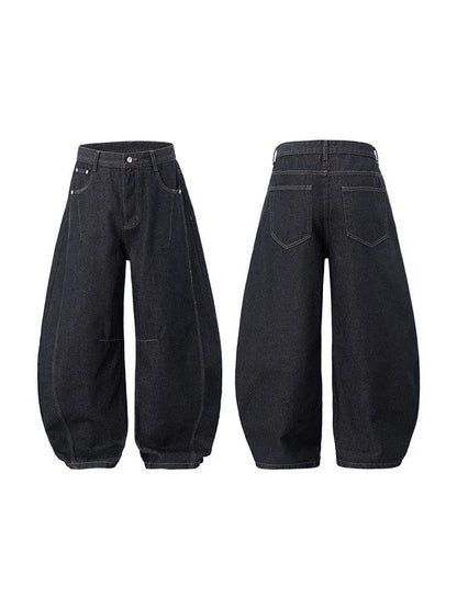 Men's wide leg denim trousers in original cow colour showing mid-waist design and relaxed fit