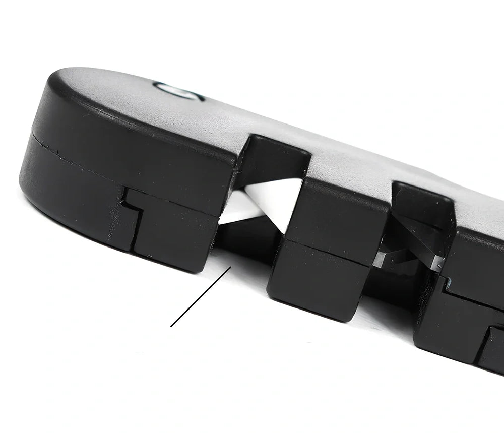 Black Pocket Pal knife sharpener with carbide blades, ceramic slot, and diamond rod, 3-1/2 inches long for hiking use