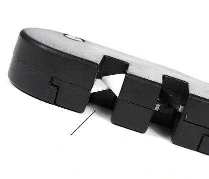 Black Pocket Pal knife sharpener with carbide blades, ceramic slot, and diamond rod, 3-1/2 inches long for hiking use