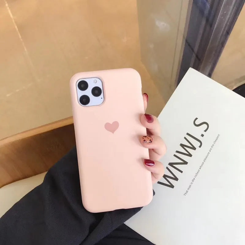 Solid colour silicone iPhone case shown in six colour options including dark green, flour and light pink.