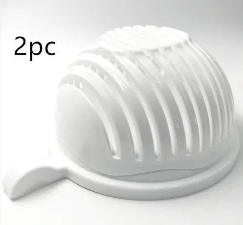 Blue salad cutter bowl showing cutting lid with seams, drain basket function, and reversible base plate