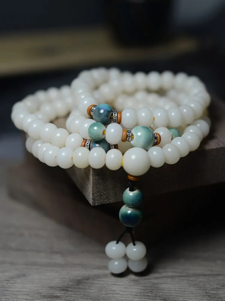 White jade bodhi root oblate bead bracelet with 108 beads in two sizes