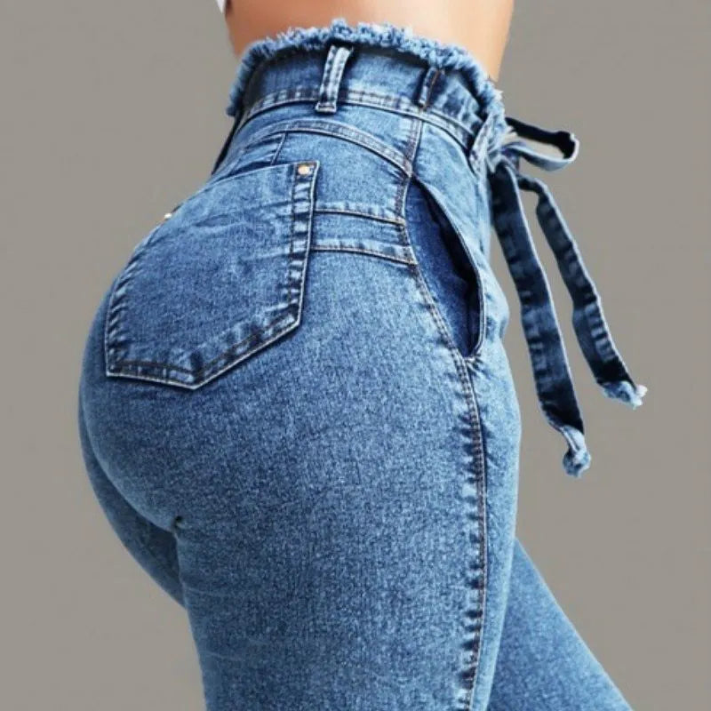 Men's fringed jeans in cowboy denim fabric showing Western-style fringe detailing