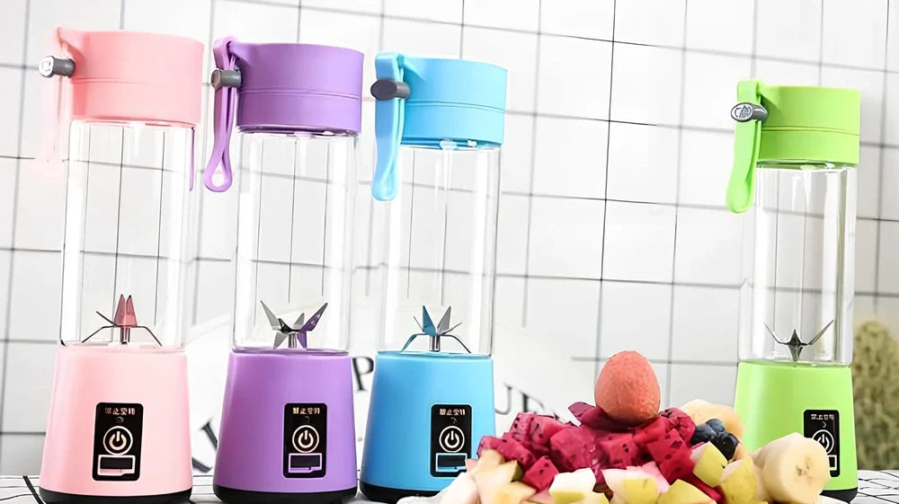 Portable USB rechargeable blender in blue with stainless steel blades, measuring 20 cm tall, for making smoothies.
