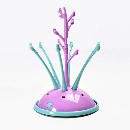 Portable baby bottle drying rack in green and purple, made from safety PP material