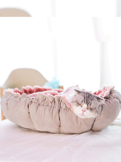 Plush and soft pet bed in a stylish petal-pink design, ideal for cats and small dogs