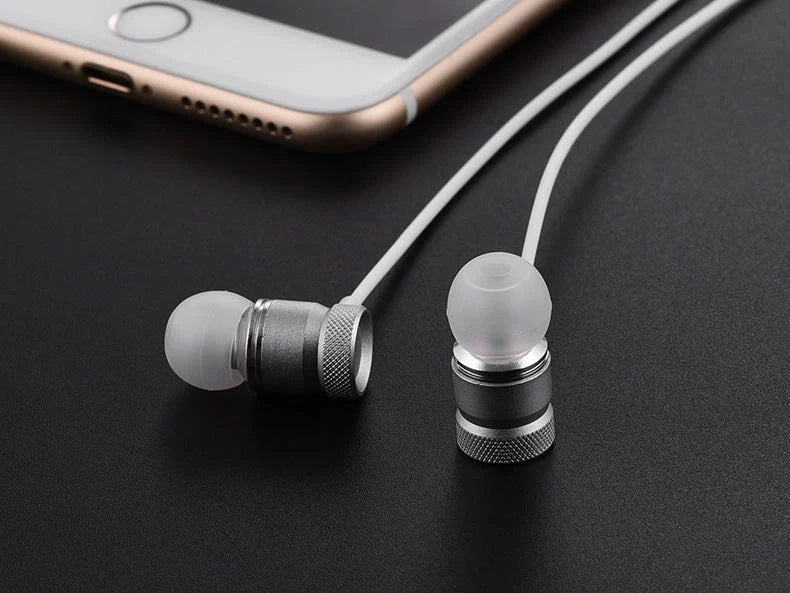 In-ear music video headphones with environmental protection TPE material in black, silver, pink, and gold
