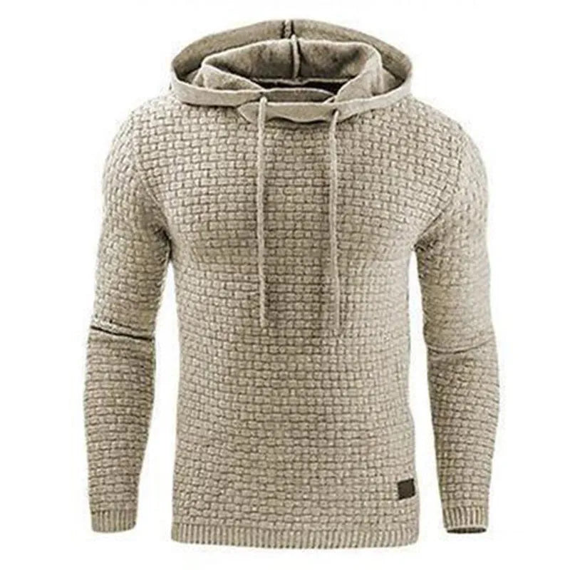 A man wearing a cotton-polyester blend hoodie available in nine colours including black, navy, and red.