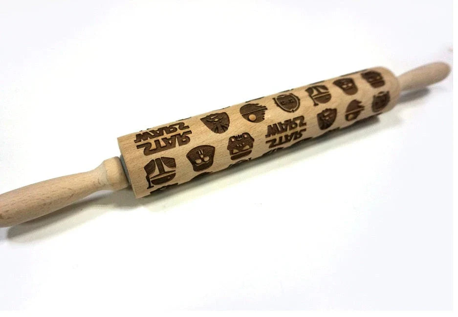 Festive rolling pin with embossed Christmas designs for easy imprinting on dough