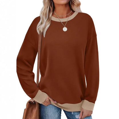 Loose fit striped long sleeve top for women on a hanger, shown in apricot colour.