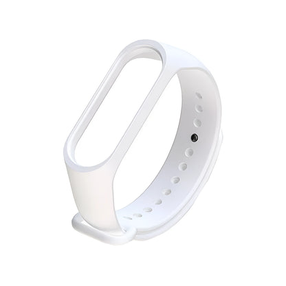 Colourful silicone replacement strap for XIAOMI MI Band 3 smart watch on a wrist.