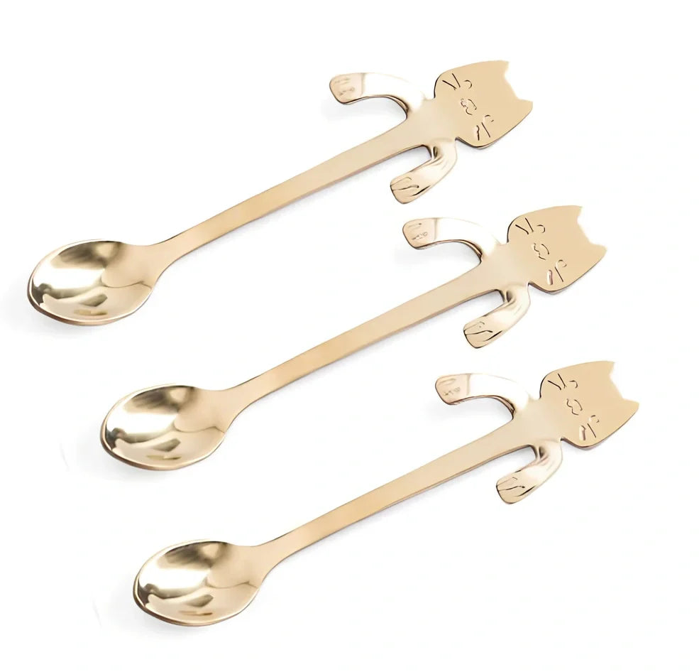 Stainless steel coffee spoon with cartoon cat handle showing hanging hole and smooth edges