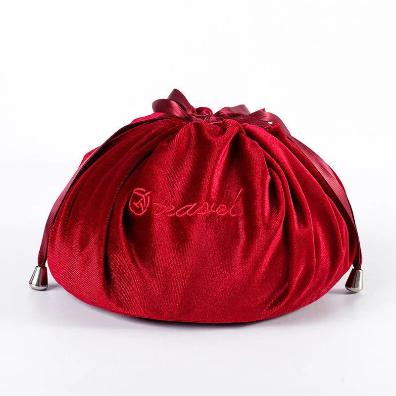 Adorable rabbit ear velvet cosmetic bags in various colors for storing and organizing makeup, toiletries, and other beauty essentials.