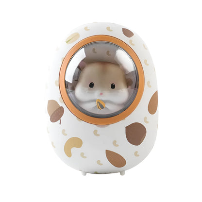 White Hamster space capsule design hand warmer and 5000mAh USB power bank unit.