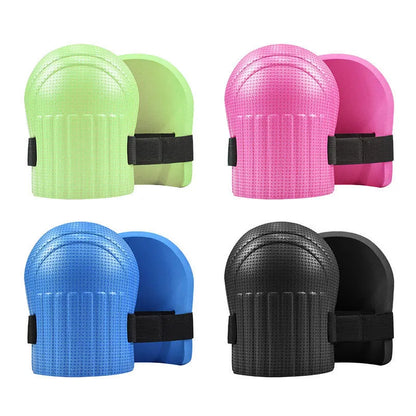 A pair of thick EVA foam kneepads in blue, shown on a tile floor.
