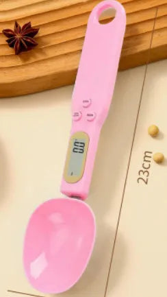 White digital spoon kitchen scale with LCD display showing weight measurement