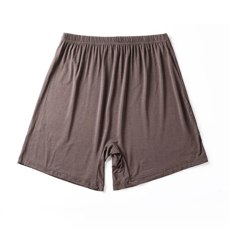 Men's solid colour high-waist boxers in modal fabric laid flat.